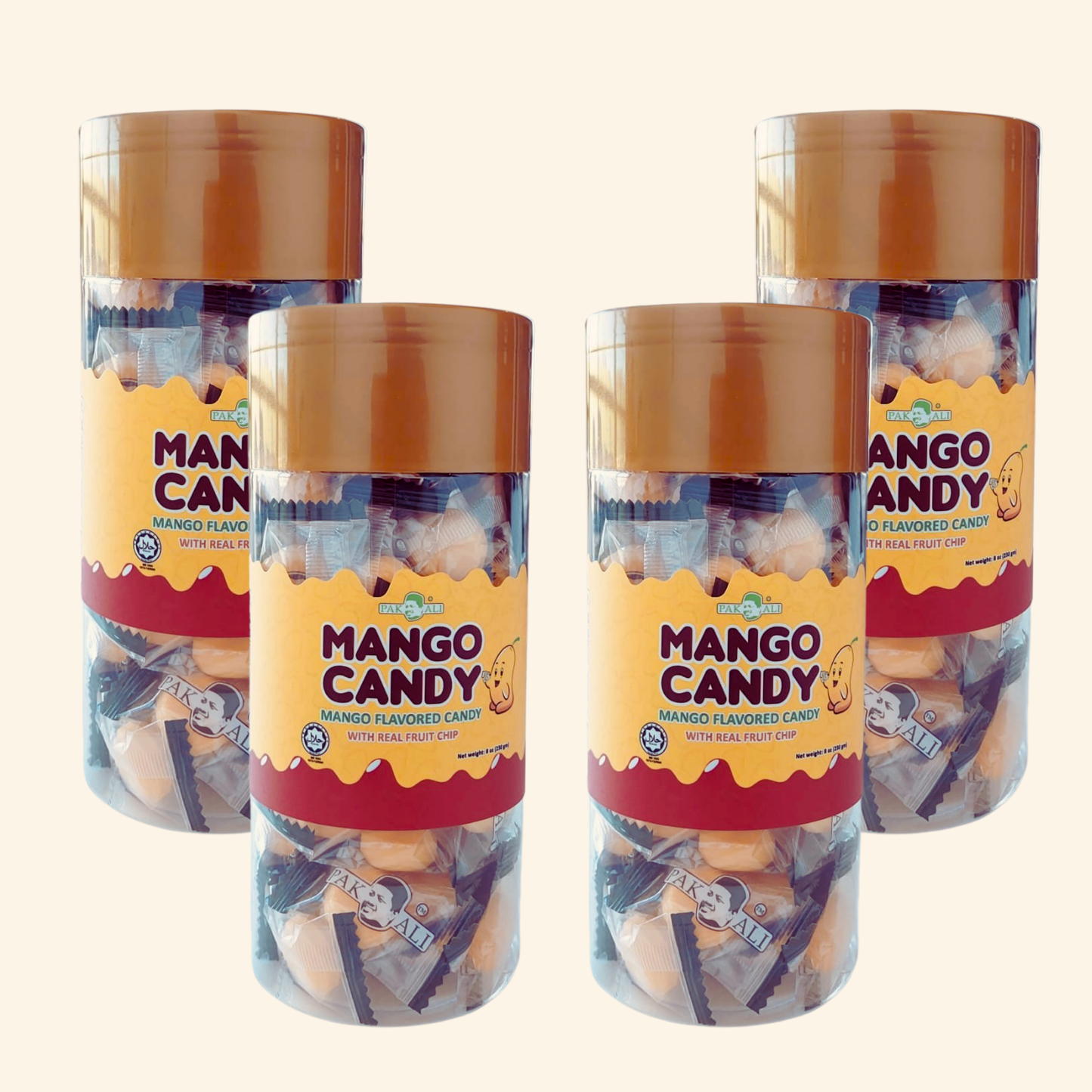 Four cylindrical jars of mango candy on a white background